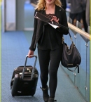 eliza-taylor-danielle-panabaker-leave-vancouver-for-home-07.jpg